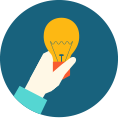 a hand holding a light bulb
